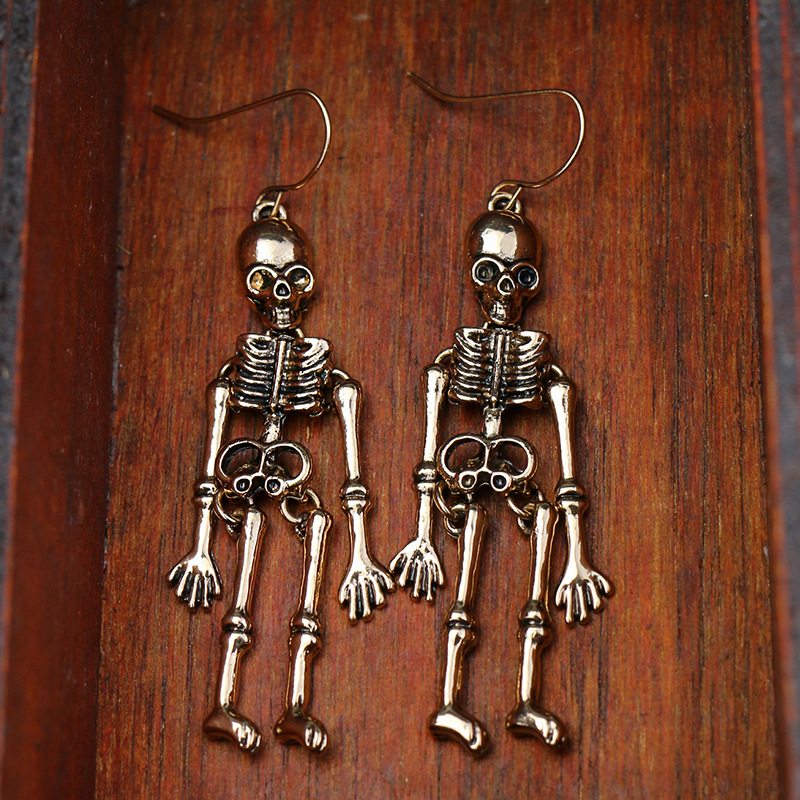 Skeleton 2025 earrings h&m